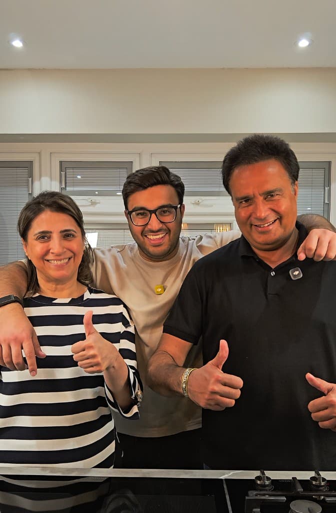 Mihir with his mama and papa after a Heldi meal