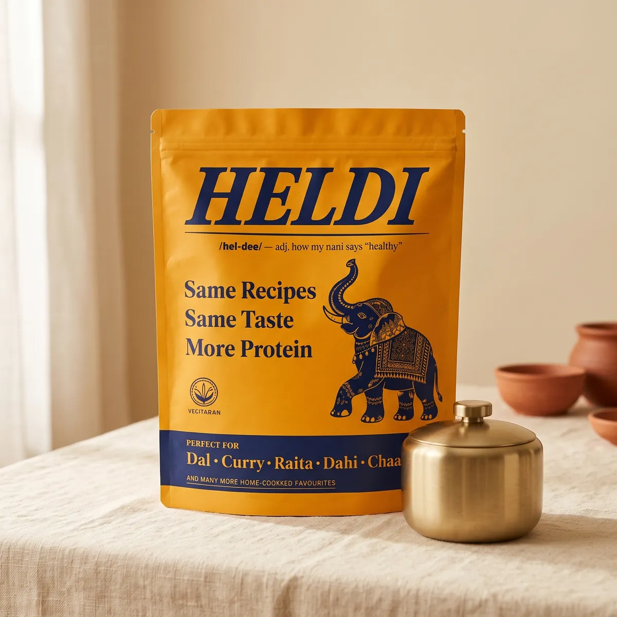 Heldi Khana pouch with its refillable gold table jar
